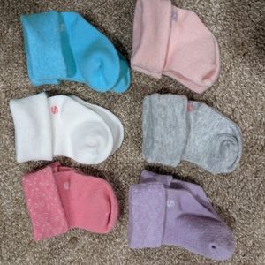 40+ pairs NB & 3-12mo baby socks